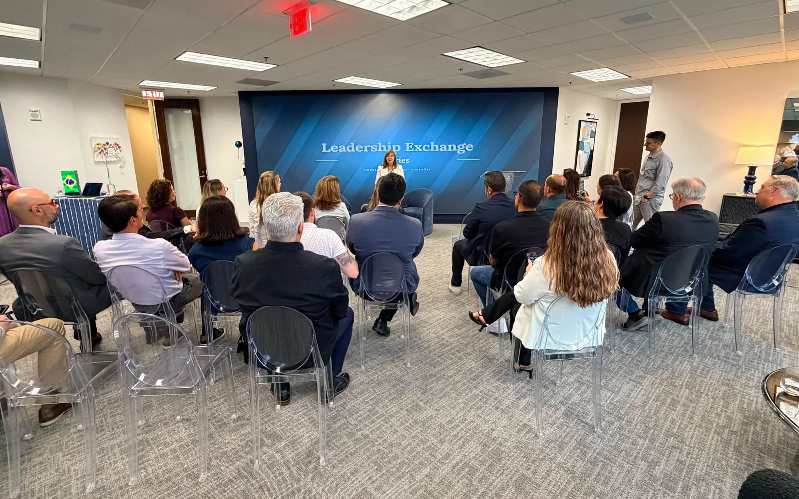 The audience seated facing the Leadership Exchange screen at House of AHC